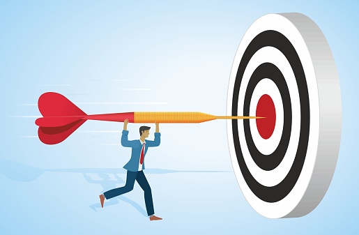 Man running and hit bulls  eye on dartboard with big red arrow. Motivation and goals, career, aiming and success in plan and strategies. Dimension 16:9.