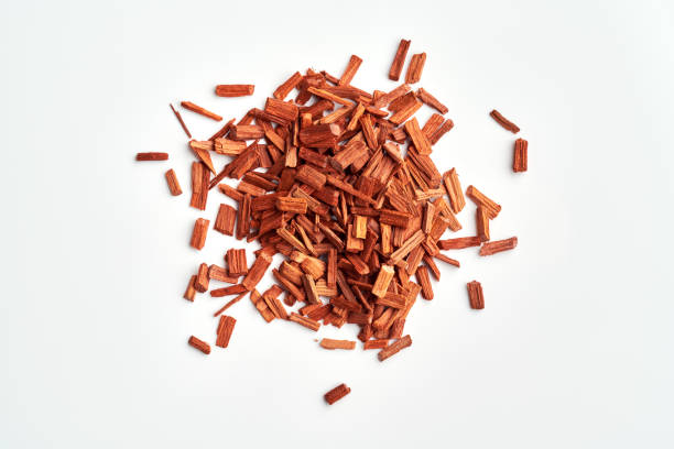 Red sandalwood chips on white background, top view stock photo