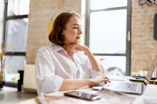 istock Woman typing on a laptop 1462639884