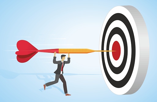 Man running and hit bulls  eye on dartboard with big red arrow. Motivation and goals, career, aiming and success in plan and strategies. Dimension 16:9.