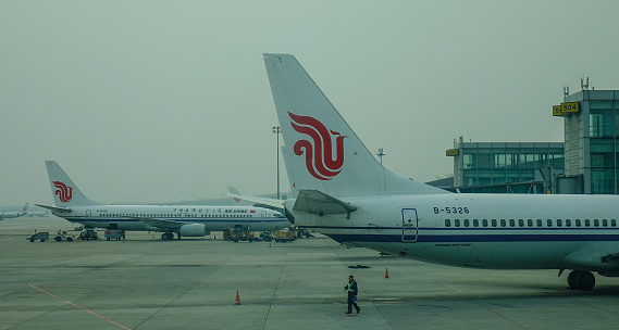 Beijing, China - Feb 17, 2018. Air China aircrafts docking at Beijing Capital Airport (PEK), China. The airport is the main hub for Air China, the flag carrier of China.