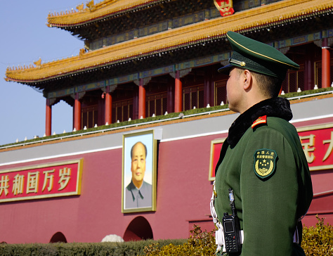 Beijing, China - Mar 1, 2018. A Chinese guard standing at Tiananmen Gate of Beijing, China.