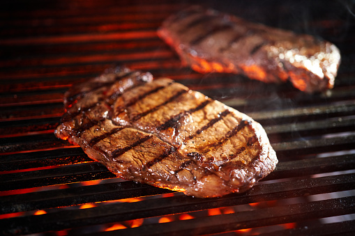 Food Safety - Grilled Steak on BBQ Grill