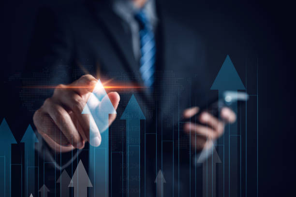 istock Growth arrows increase planning business target chart to successful. Businessman touching arrows analyst to leadership objective goal. Corporate strategy for finance, operations, sales, marketing. 1462651853