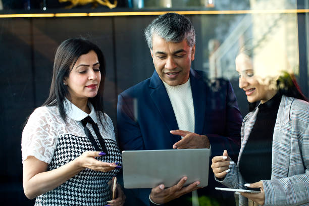 istock Business people with laptop at office 1462654911
