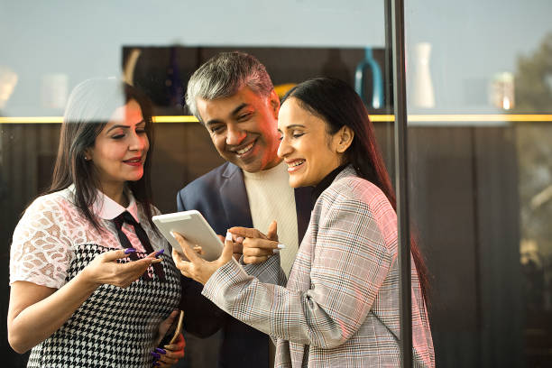 istock Business people with digital tablet at office 1462655147