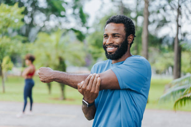 istock Portrait of a man stretching to do physical exercise 1462659194