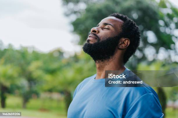 Portrait Of A Man Breathing Fresh Air In Nature Stock Photo - Download Image Now - Men, Relaxation, Healthy Lifestyle