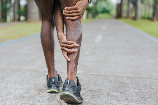 Portrait of a man with calf pain Portrait of a man with calf pain human leg muscle stock pictures, royalty-free photos & images