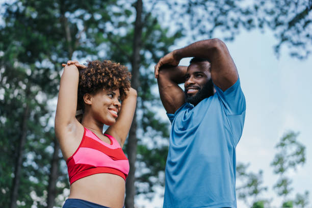istock Couple stretching to do physical exercises 1462659425