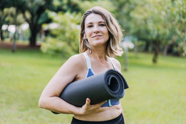 istock Mature woman going to practice physical exercise looking at camera 1462659717