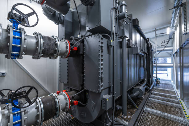 bomba de calor de absorción de bromuro de litio en una planta de energía de biocombustible - giant boilers fotografías e imágenes de stock