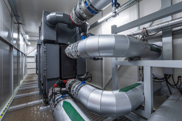 абсорбционный тепловой насос бромида лития на биотопливной электростанции - pipe power station valve water стоковые фото и изображения