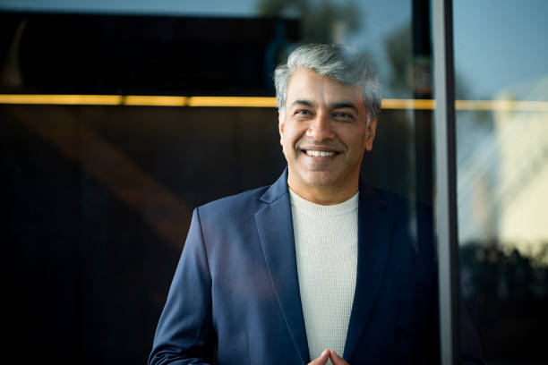 istock Businessman looking away through glass window 1462660323