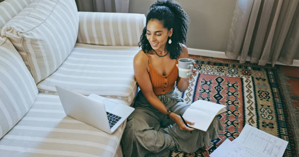 istock Study, planning and happy woman or student with ideas, creativity and paperwork for university online education. E learning, notebook and relax, boho person with pc, journal and writing inspiration 1462663944