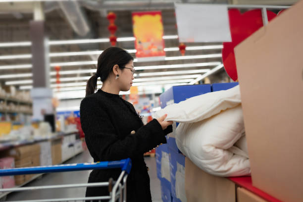 istock Asian lady is choosing quilt wicking 1462665664