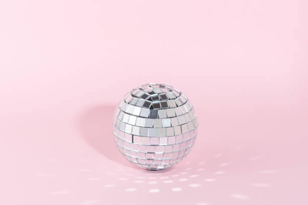 istock Shining disco ball on pink background. Minimal party concept. 1462668099
