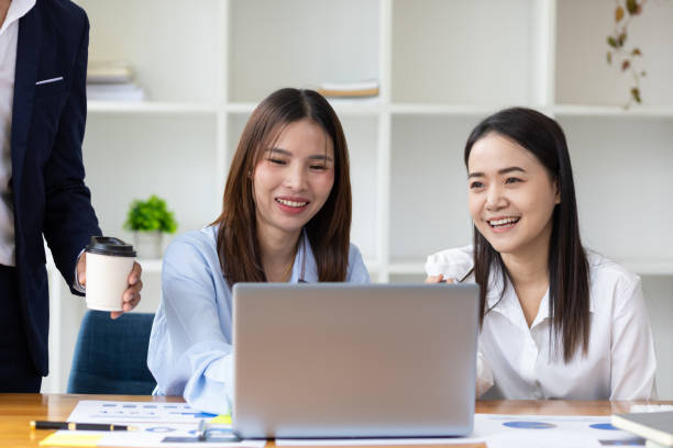 istock Meeting colleagues to discuss projects and plan collaboration on a laptop. 1462668801