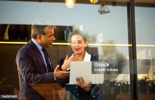 Business People With Laptop At Office Stock Photo - Download Image Now - India, Indian Ethnicity, Working