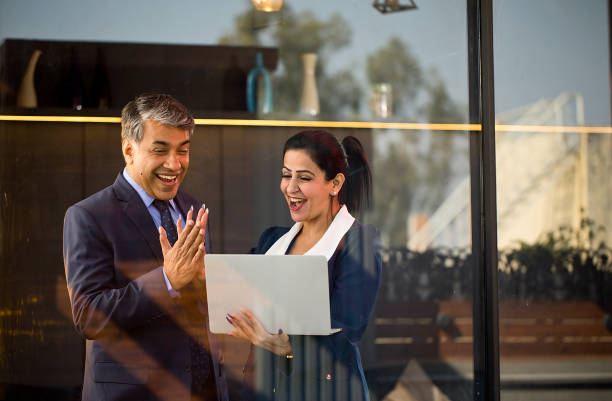 istock Business people with laptop at office 1462675096