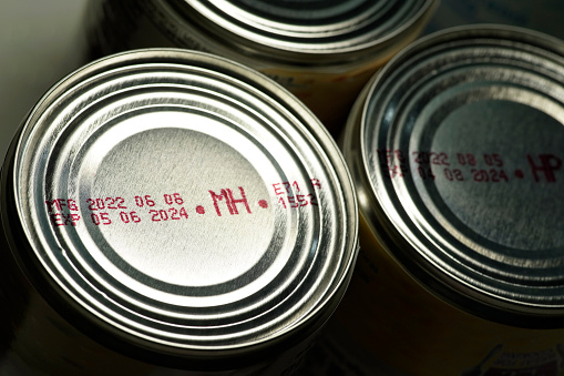 Production and expiry dates on canned food