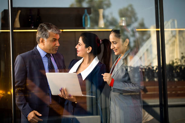 Business people with laptop at office
