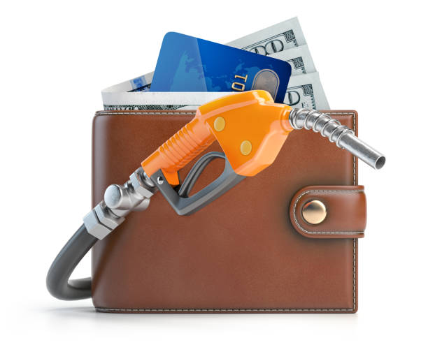 istock Wallet or purse with money, credit card and gas pump nozzle. 1462675607