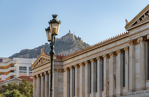 A picture of the Lycabettus Hill overlooking the Academy of Athens.