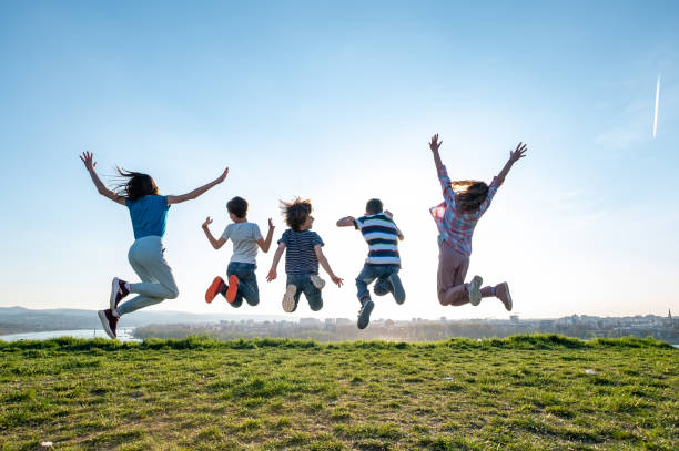 istock Happy children are jumping 1462686823