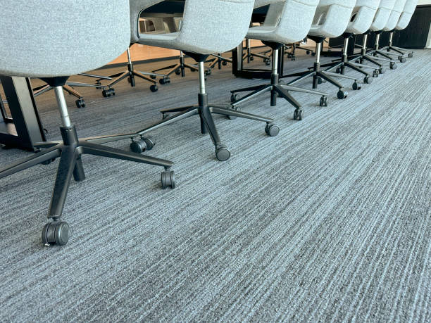 istock Office chairs in a row in a conference room 1462687311