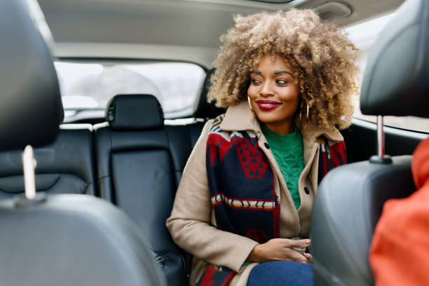 istock African woman looking out the car window 1462689094