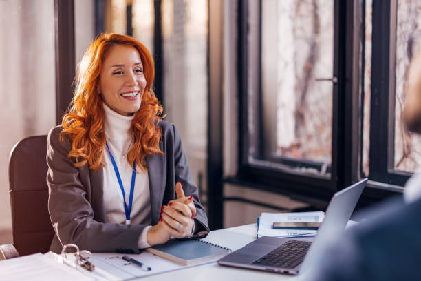 istock A successful businesswoman is talking to a client in her office. 1462697227