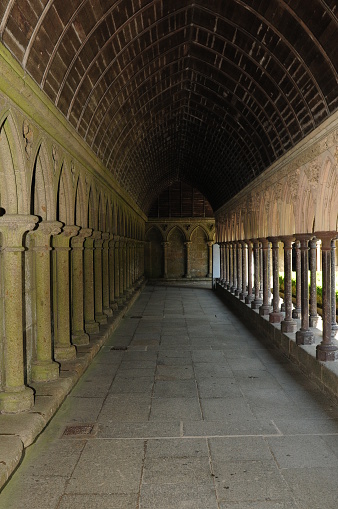 Cloister Walk With A Vault At The Abbey Of The Famous Rocky Island Mont-Saint-Michel In Bretagne France On A Beautiful Sunny Summer Day