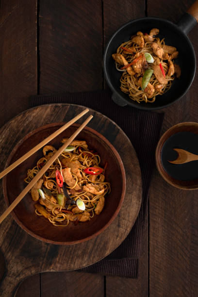 istock chicken  noodles in a bowl on a rustic background 1462704521