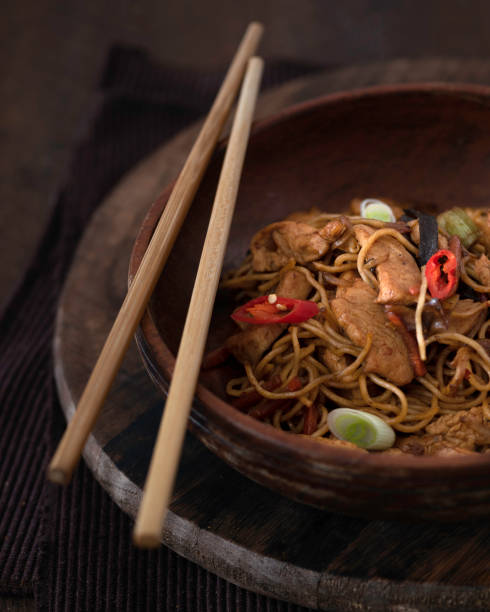 istock chicken  noodles in a bowl on a rustic background 1462705097