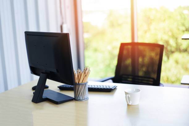 istock Desk in office with computer desktop pencils and coffee cup for designer desk - Table working place business office nature background 1462709401