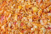Stewed cabbage texture, top view, close up, macro.