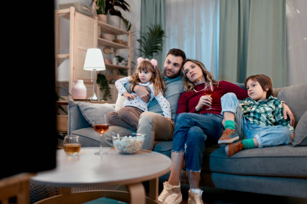 istock Parents watching something with their kids 1462717729
