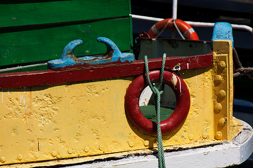 Old multi color painted ship bow. Betanzos, A Coruña province, Galicia, Spain.