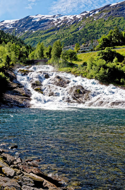 istock Landscape with Hellesyltfossen waterfall - Geiranger, Norway 1462720658