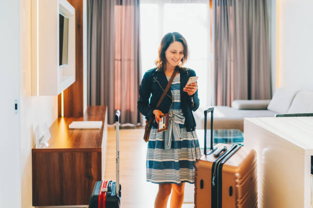 istock Tourist in hotel room flight reservations 1462721056