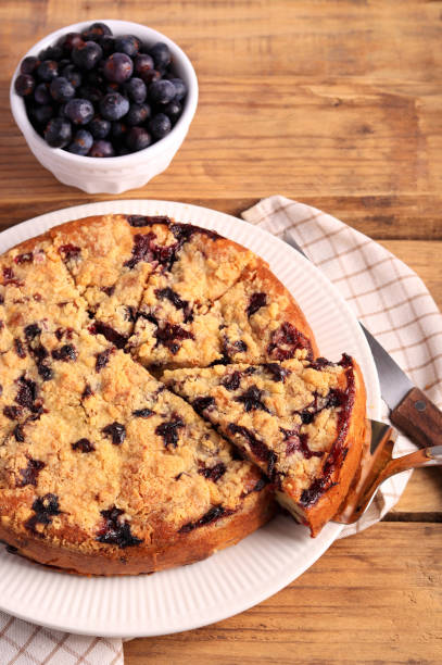 istock cake with berries and crumble topping 1462726770