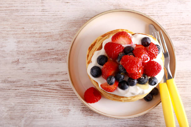 istock pancakes with yogurt and mix berry topping 1462727530