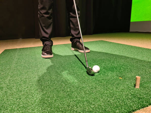 istock Male golfer plays golf indoors on golf simulator closeup 1462727767