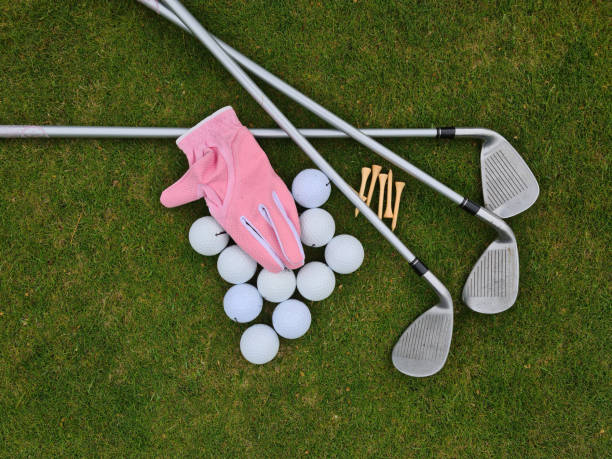 istock Golf equipment on green grass on golf course 1462727787
