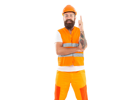 studio shot of inspired with idea builder wearing helmet. builder isolated on white background. builder man in uniform. bearded builder in orange vest.