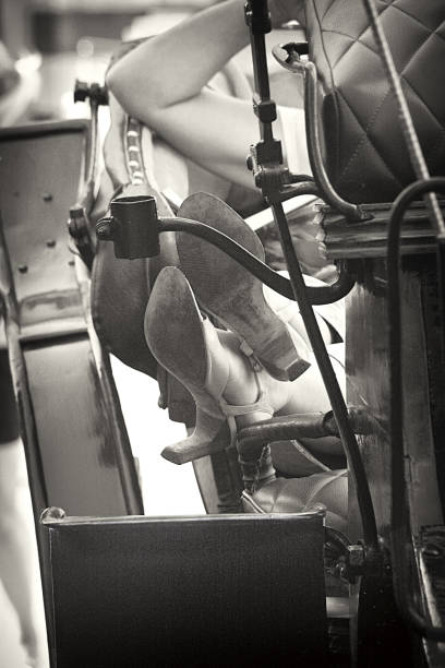 A woman is resting on a carriage.