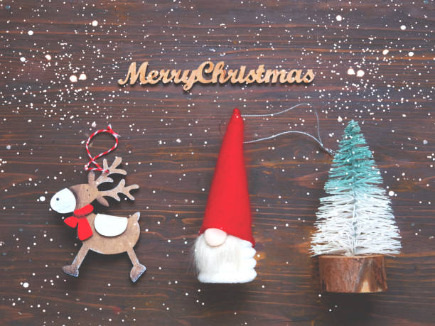 istock Decorative toys on wooden background. Christmas decor 1462748421