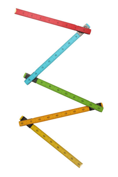 istock Classic colorful wooden folding ruler for precisely measuring in inches isolated on white background. Multicolor folfable tool concept 1462751697