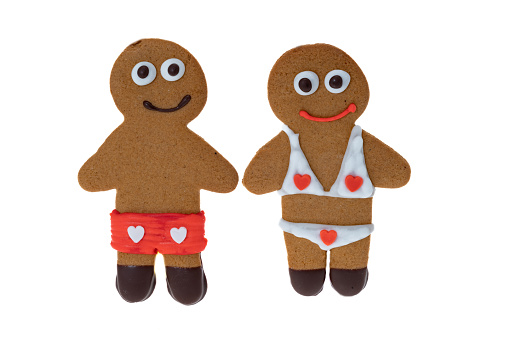 Gingerbread man cookie ornaments isolated on white background 